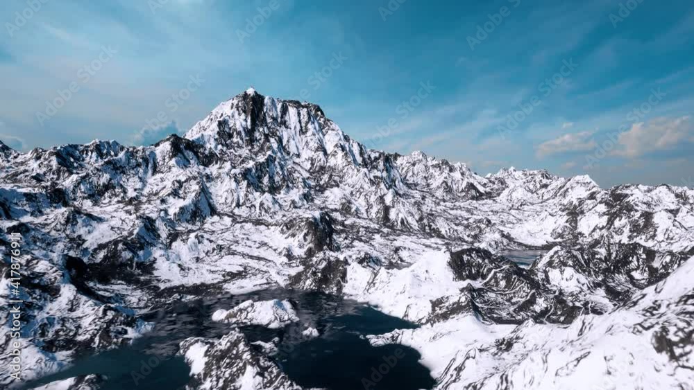 A majestic aerial shot over the lakes and ridges of a beautiful snow-covered mountain range. A majestic aerial shot over the lakes and ridges of a beautiful snow-covered mountain range.