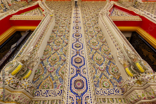 Mosaic Ceramic Abstract Wall In Wat Bang lamung Thai Temple,Beautiful detail of traditional Thai art decorated made from ceramic tile ,Art of borken mosaic interior and decorate at Banglamung Temple , photo