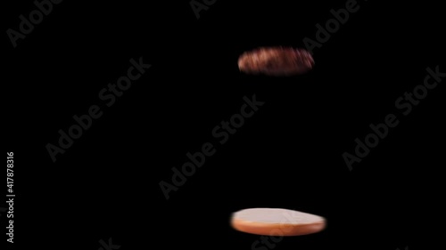 Fast food burger spinning, with its layers appearing an catapulting on top, one after another - isolated with alpha channel, animation