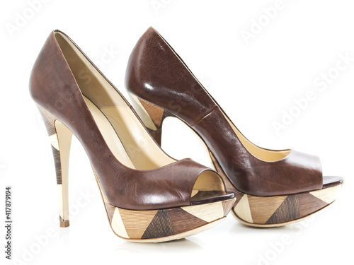 brown leather women's shoe on high heel, view from side