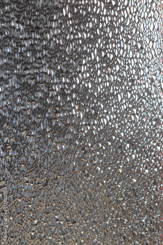 Fototapeta premium Translucent Glass Close-up Surface with Refractive Light. Uneven Bumpy Semitransparent Texture Background