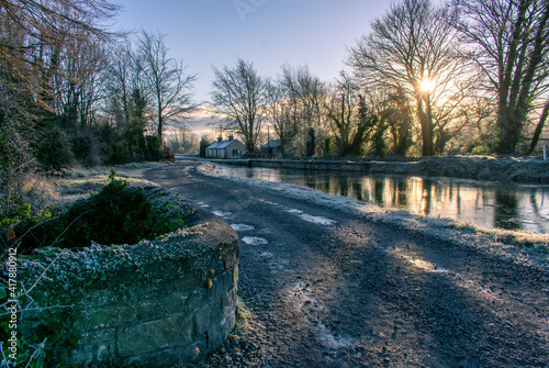 Frosty canal landscape at dawn