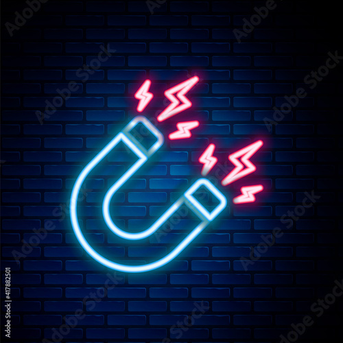 Glowing neon line Magnet with lightning icon isolated on brick wall background. Horseshoe magnet, magnetism, magnetize, attraction sign. Colorful outline concept. Vector.