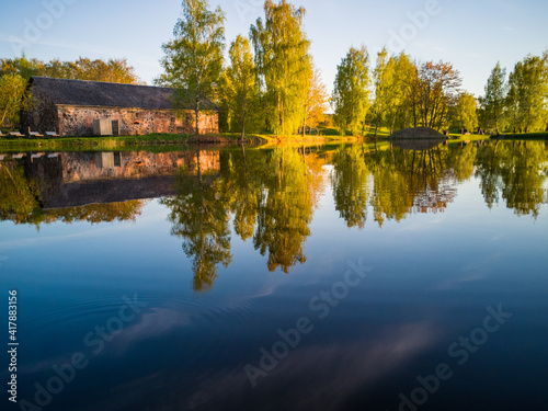 Beautiful Tree Reflection in Lake on Sunny Day - Autumn Colors © Reinholds