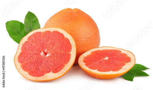 Fresh grapefruit and slices isolated on white background