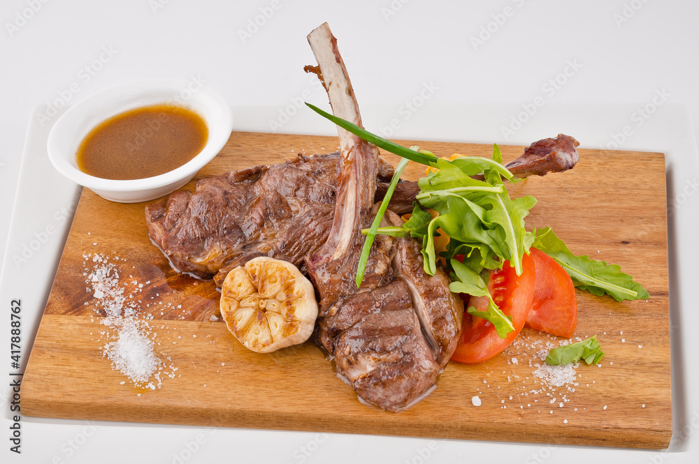 meat bbq with vegetables and sauce meat bbq with vegetables and sauce