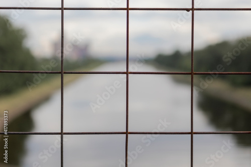 Metal lattice overlooking the river.