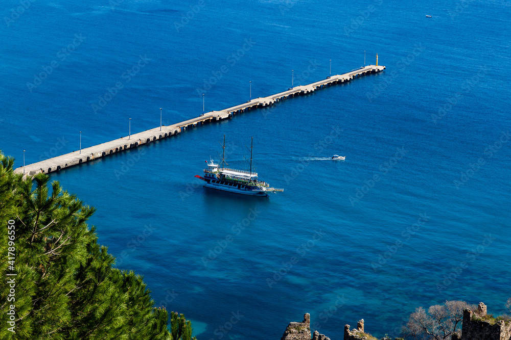 Pier in the blue sea.