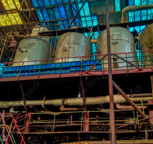 three old evaporators in an old mill , photo from lower angle