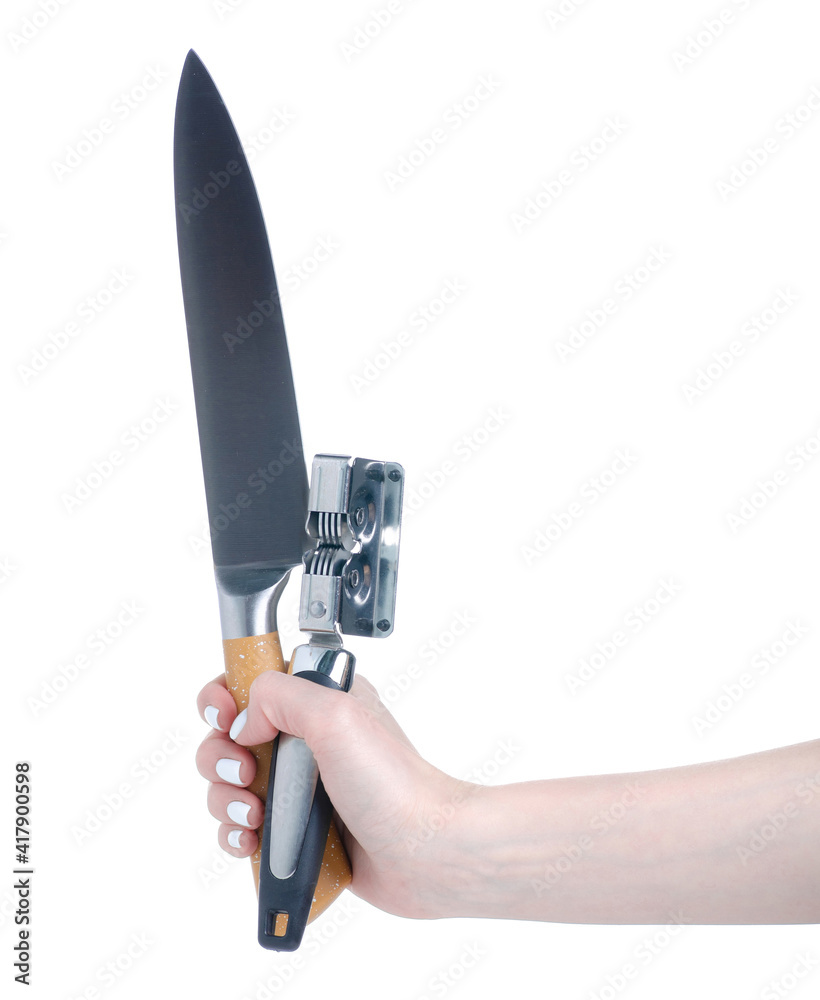 Manual knife sharpener with knife on white background isolation Manual knife sharpener with knife on white background isolation