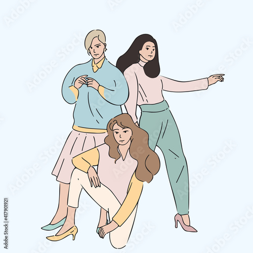 Group of women or girls standing together and pose. Cartoon characters vector illustration of Women's friendship or sisterhood. The concept of the female's empowerment movement