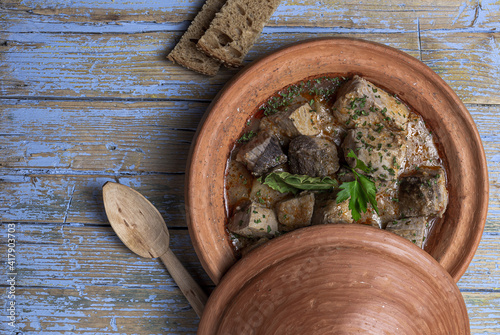 Traditional homemade fish tajin stew with potatoes