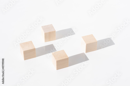 Wooden cubes on a white background. Business and design concept  Symbol of leadership