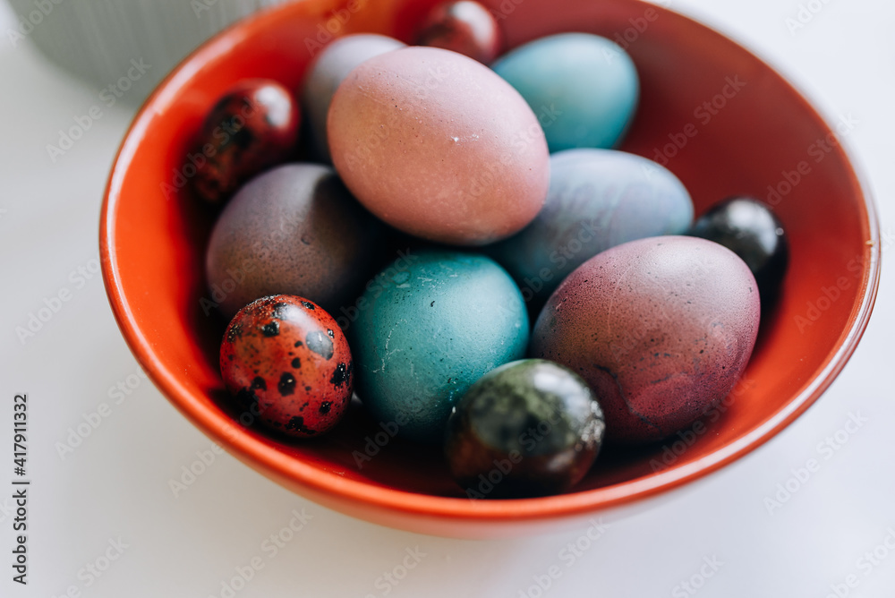 Easter eggs in a plate on the table Easter eggs in a plate on the table