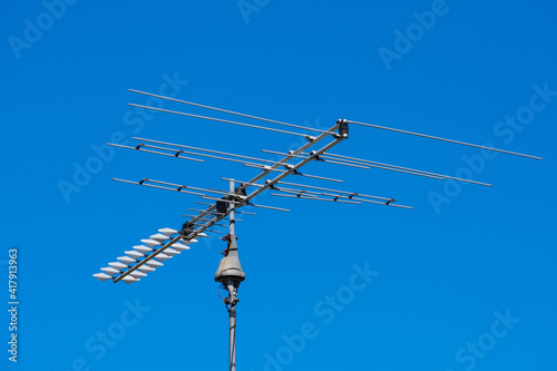 Vászonkép Outdoor TV antenna mounted on pole