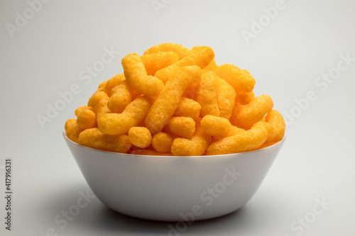 cheese puffs in a white bowl, Cheese Doodle Day, crisps, puffcorn