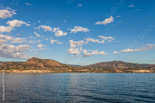Panoramic view of idyllic summer landscape in the Canada with clear mountain lake background