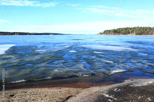 View over the lake Malar och Malaren(Mälaren in Swedish). During the winter or early spring. This ice on the water. Nice landscape and nature. Stockholm, Sweden, Europe.