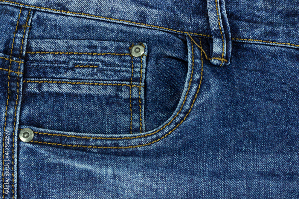 Jeans pocket - fashion background, copy space
Jeans pocket - fashion background, copy space