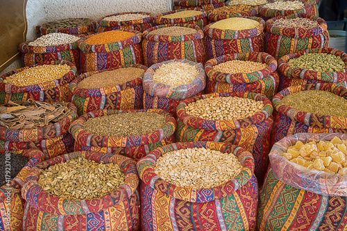 multicolored bags of cereals in the market of the east