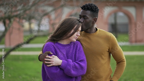 Male friend consoling depressed young woman. interracial couple partnership