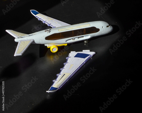 A broken toy plane, The concept of a plane crash.