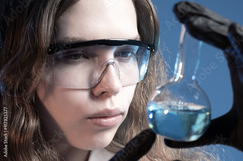 Face of a chemist girl in s...