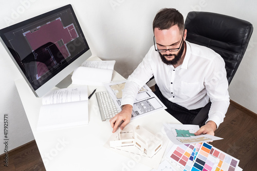 The architect works in his ...