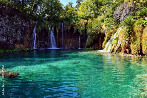 Famous Croatian National Park Plitvice lakes. Incredible blue color of water in karst lakes