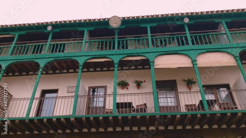 Chinchon is a traditional old spanish town in Madrid. With his famous picturesque ancient wood balcony facade is a travel destination for tourism and travel photo