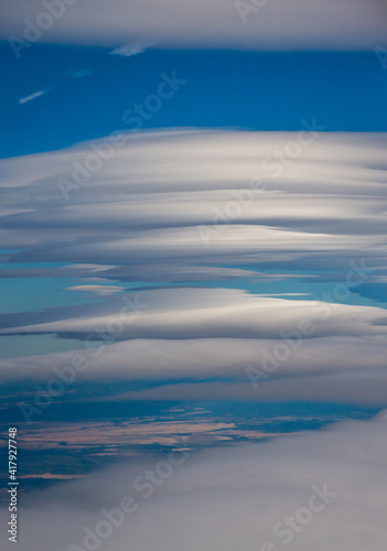 Lenticular Clouds at 30,000 feet over the Oregon high desert. © Bob