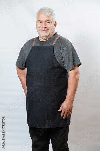 Mockup of man with apron - Elderly man with apron - Senior worker with uniforms