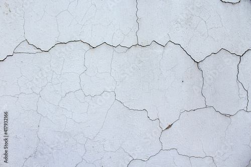 Cracked white old wall background. Horizontal image