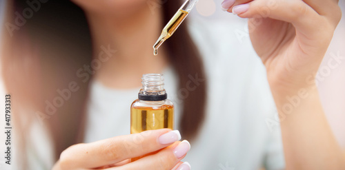 Banner woman hair care, drop of oil restore and recovery is applied to head bulbs