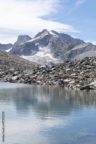 An alpine lake in the Swiss Engadine Mountains, near the village of Sankt Moritz, Switzerland - August 2020. © Roberto