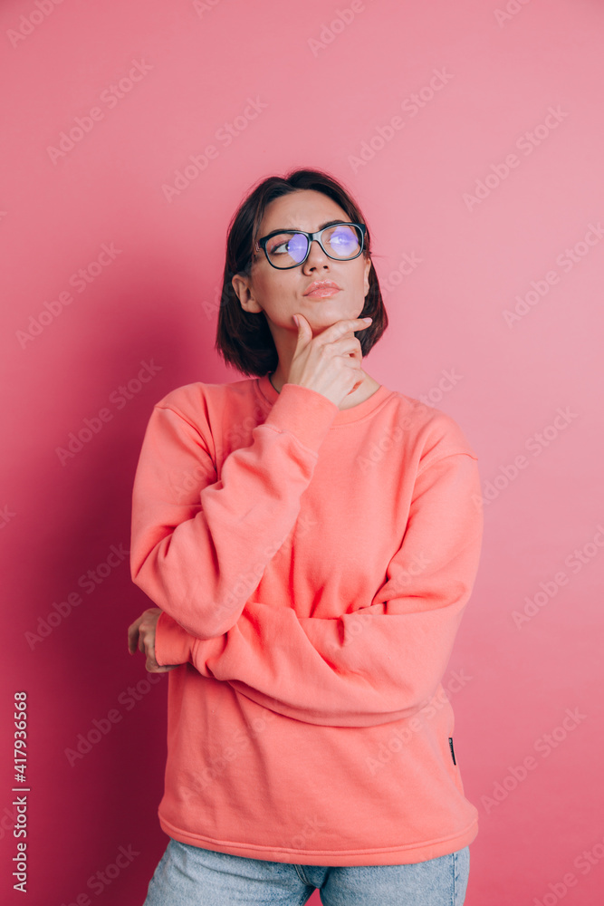 Woman wearing casual sweater on background thinking worried about a question, concerned and nervous with hand on chin