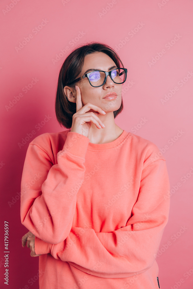 Woman wearing casual sweater on background thinking worried about a question, concerned and nervous with hand on chin Woman wearing casual sweater on background thinking worried about a question, concerned and nervous with hand on chin