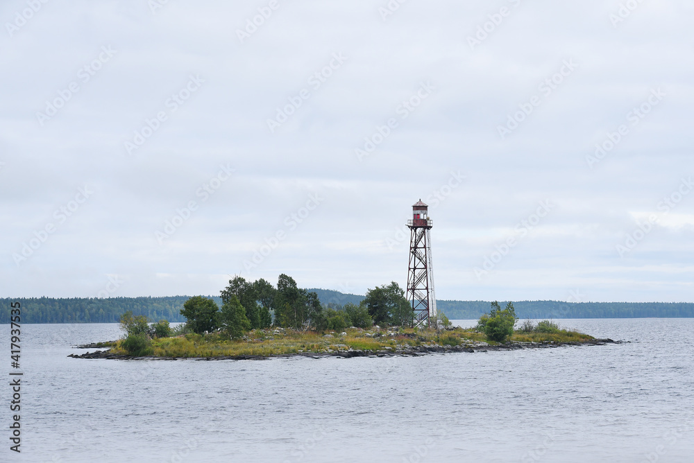 lighthouse on an island in the lake