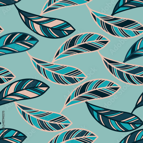 Seamless pattern with abstract geometric feather shapes in blue and green tones photo