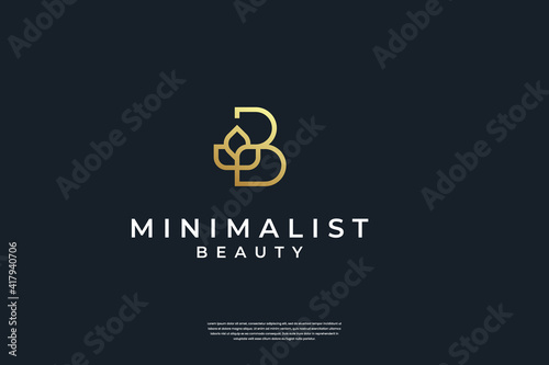 Minimalist golden initial B and leaf logo design with line art style photo