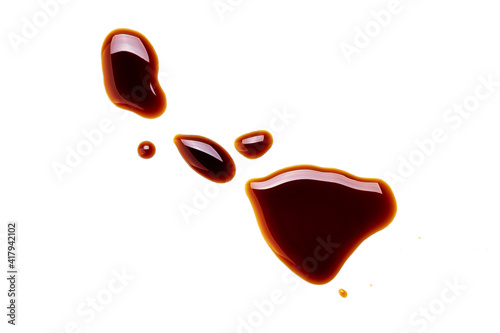 soy sauce drip isolated on a white background. soya sauce swirl cut out. above view. studio shot photo