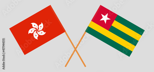 Crossed flags of Hong Kong and Togo. Official colors. Correct proportion