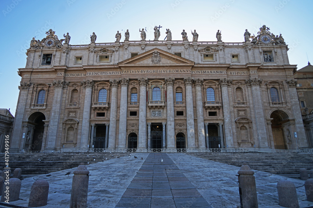 World's largest The Papal Basilica of Saint Peter front view with balcony before sunset, Vatican