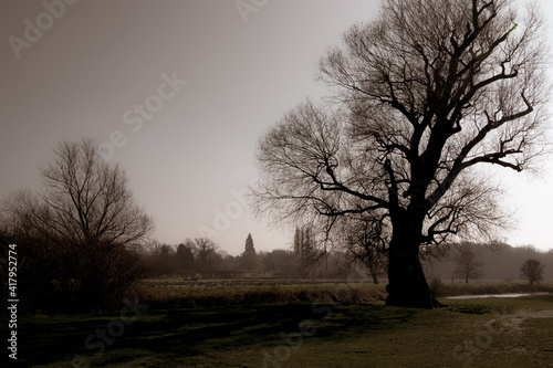 A riverside field in England in winter.