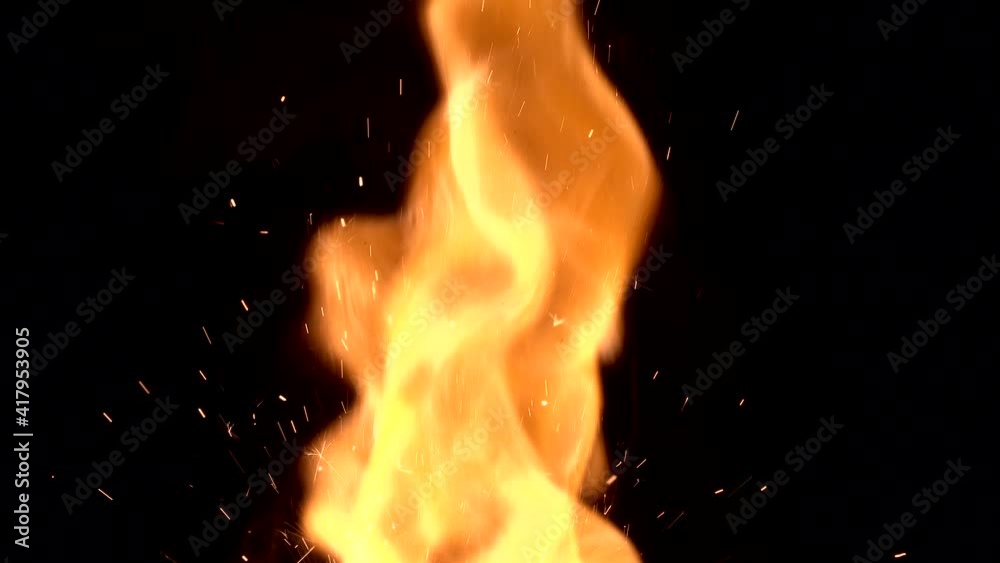 Burning hot bonfire fire sparks on a dark background. Fire sparks animation, slow motion