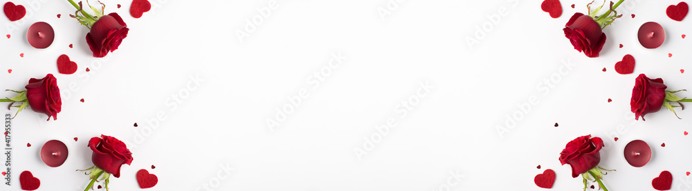 Photo overhead of roses hearts confetti and candles isolated on the white background Photo overhead of roses hearts confetti and candles isolated on the white background