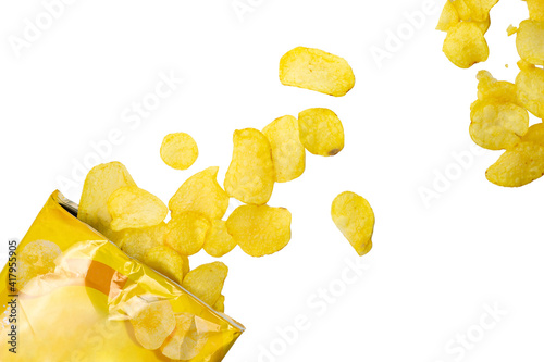 potato chips spilling out of a pack on a white background. snacks and snacks for beer