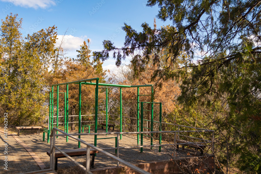 Playground in a public park. Positive emotions, spring sunny day. Playground in a public park. Positive emotions, spring sunny day.