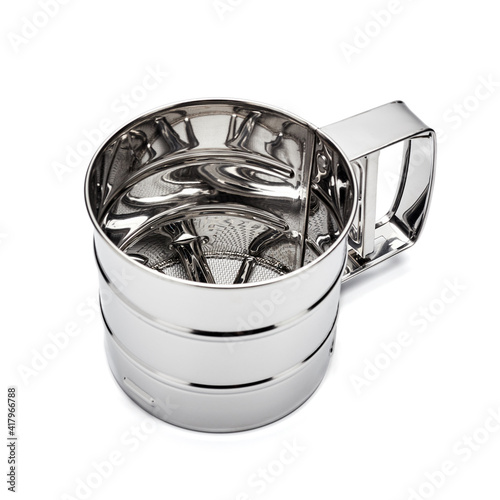 metal flour sifter on white background isolate