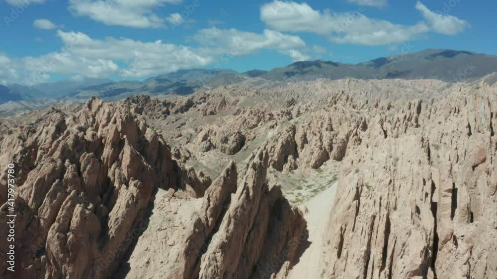 Aerial - Quebrada de las Flechas ravine, Argentina, wide rising shot